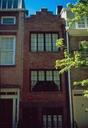 So thin, this building in Greenwich is known as 75.5 Bedford Street.